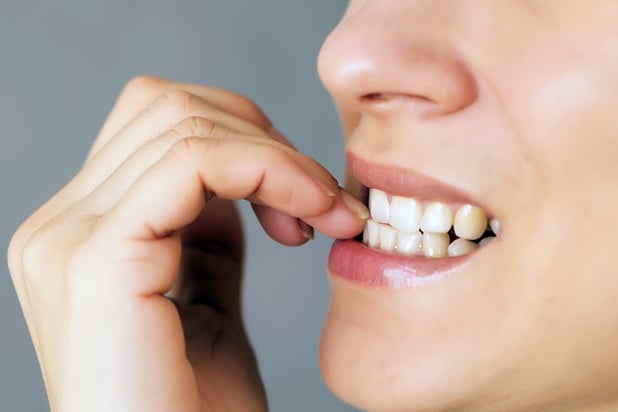 How Nail Biting Damages Teeth